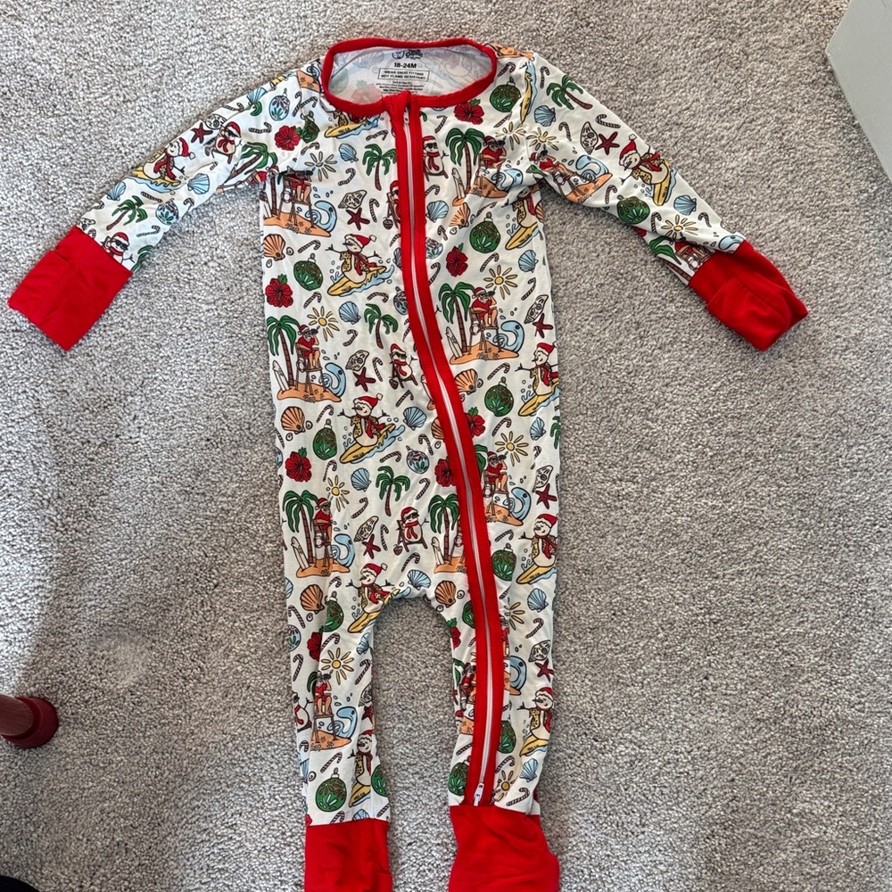 Tuck & charco zip up Santa beach sleeper